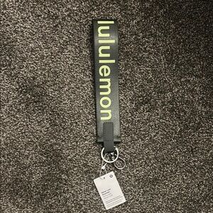 Lululemon Black Keychain with Neon Green Logo